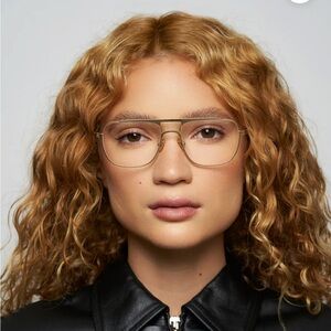 Elisa Johnson gold frame glasses